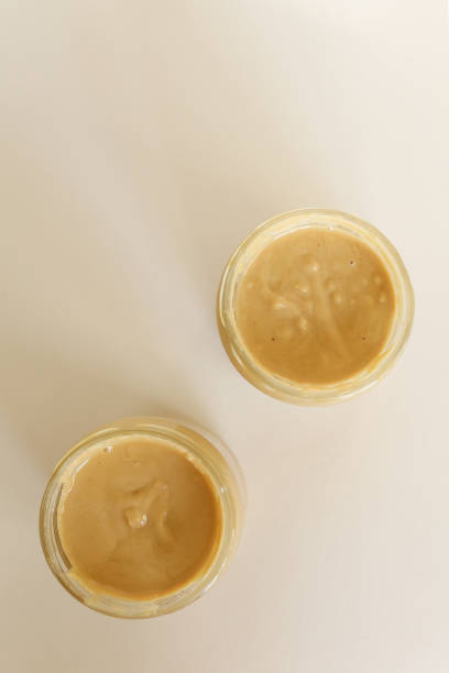 istock Peanut or Almond Butter in jar 1315891569