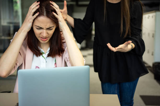 istock Bullying with a boss shouting to an employee 1315901157