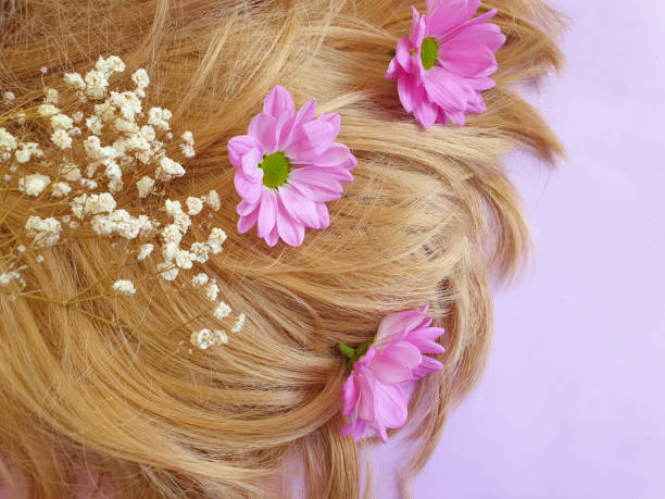 istock hair flower on a colored background 1315901335