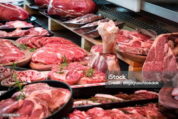Raw Meats On Butchers Shop Stock Image Stock Photo - Download Image Now - Meat, Butcher's Shop, Beef