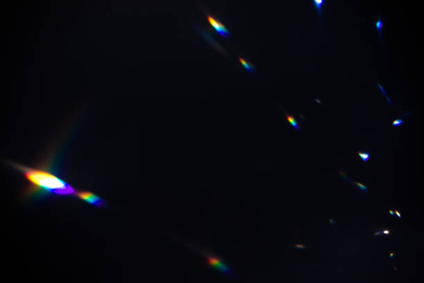 istock colorful warm rainbow crystal light leaks on black background 1315909213