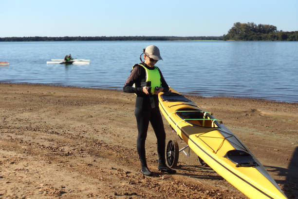 istock woman in her kayak 1315910439