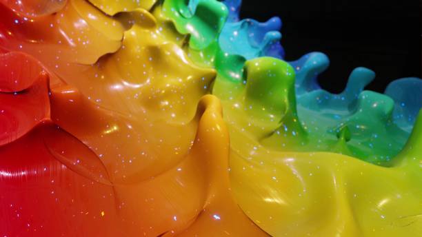 istock Liquid gradient rainbow color. Bright glossy paint surface as abstract festive background. Glitters on viscous liquid with 3d splashes on surface like drops. 3d render 1315911843