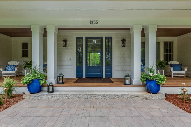 Elegant but modern front porch Lots of space to sit and relax on the front area of the home front door stock pictures, royalty-free photos & images