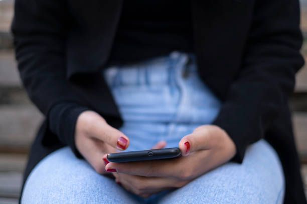 istock Young Woman use smartphone for messaging chat on a smartphone,social network tech addiction 1315913901