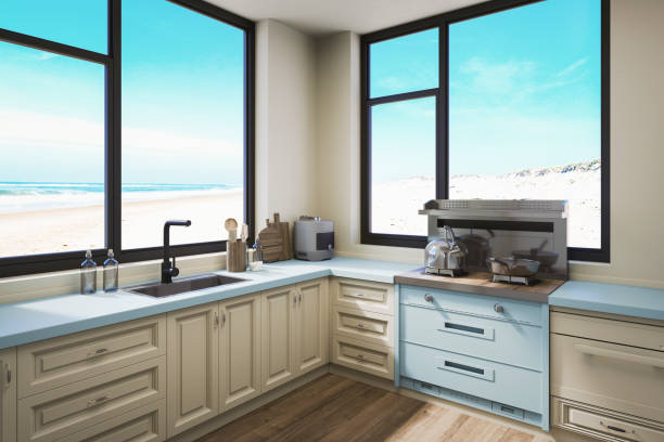 Modern holiday villa kitchen with beach view. 3D generated image.