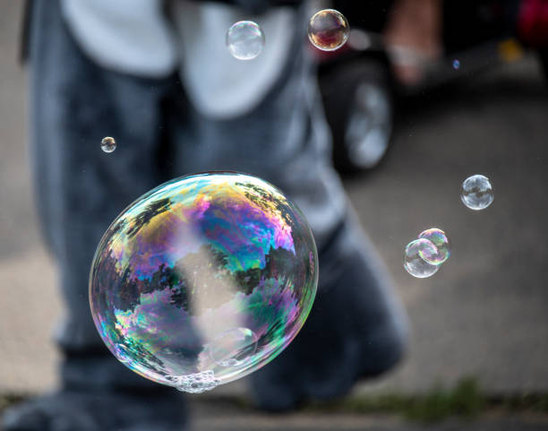 istock Soap bubble floating in the air 1315916943