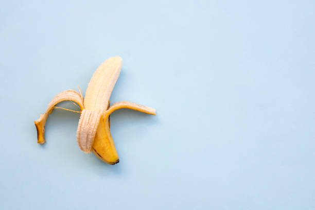 istock Yellow ripe banana peeled half 1315920213
