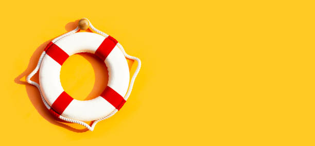 istock Lifebuoy on yellow background. 1315920284