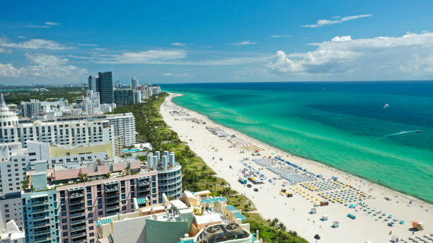 Aerial drone view of South Beach and Ocean Drive in Miami Beach, in a sunny day of May 2021 Aerial drone view of South Beach and Ocean Drive in Miami Beach, in a sunny day of May 2021 miami beach stock pictures, royalty-free photos & images