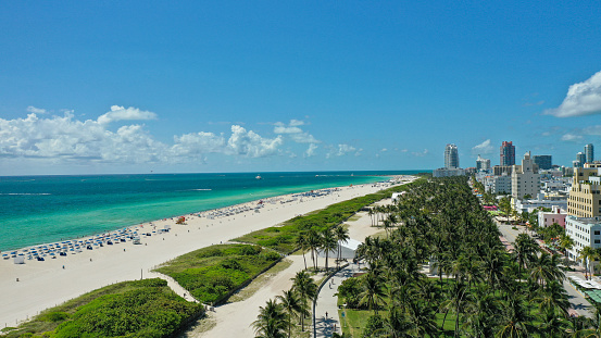 Aerial drone view of South Beach and Ocean Drive in Miami Beach, in a sunny day of May 2021