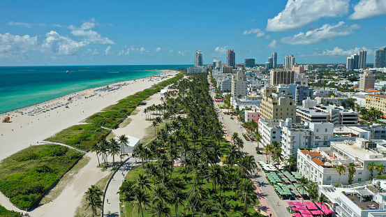 Aerial drone view of South Beach and Ocean Drive in Miami Beach, in a sunny day of May 2021