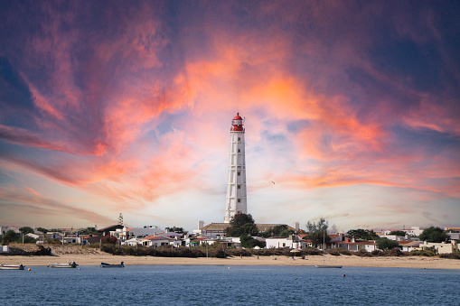 Beautiful lighthouse at the sunset+ in Olhão, Faro District, Portugal
