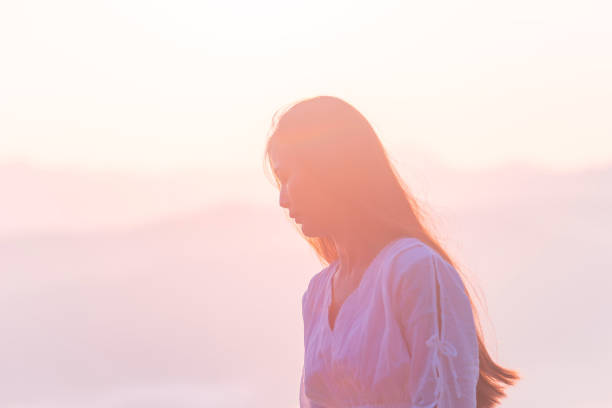 woman portrait, Thai woman tourists like photography, love to travel, Travel on trip in holiday Watch the sunrise and morning mist in Yala Province, Southern Thailand, Asia.