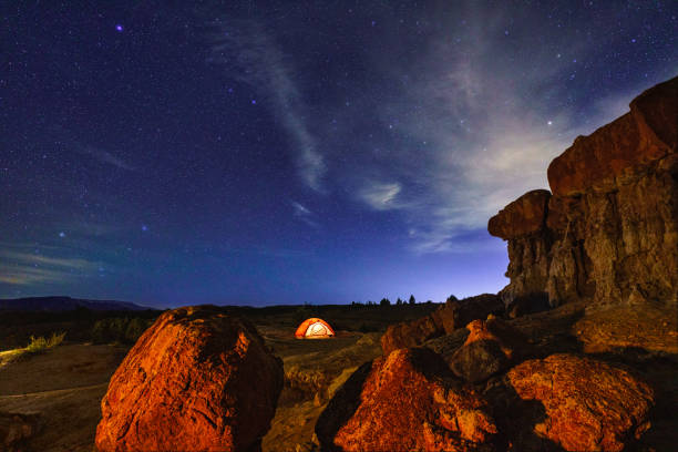 istock Tent Glowing Amongst Red Rock Hoodoo Formations at Night 1315948659