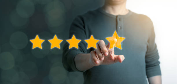 istock Excellent survey rating pressing on five star by man client. Panoramic of Customer satisfaction survey concept with copy space 1315954997