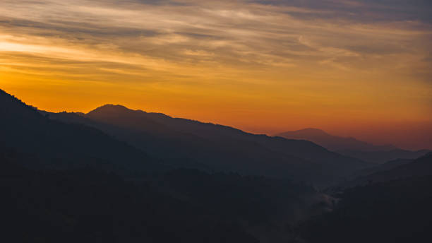 istock Sun sunrise bright sunlight over mountain. 1315957244