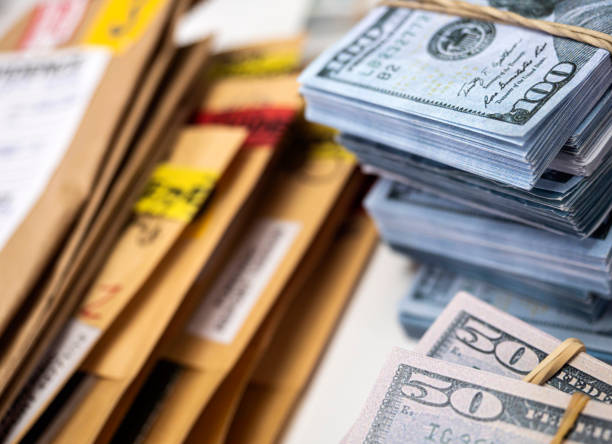 istock dollar bills in criminal investigation unit, conceptual image 1315979791
