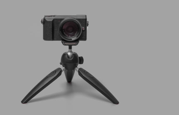 istock digital photo camera on small tripod 1315980031