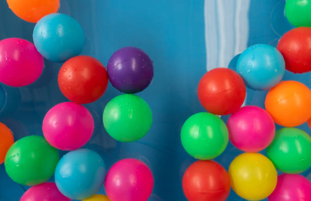 istock Colorful inflatable balls in blue Inflatable pool. 1315980727