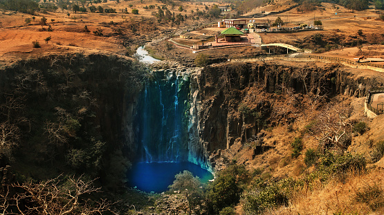 The Patalpani Waterfall is located in Mhow Tehsil of Indore district in the state of Madhya Pradesh, India. The waterfall is approximately 300 feet high. The area around Patalpani is a popular picnic and trekking spot. The water flow is highest immediately after the rainy season.