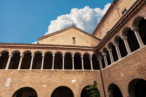 Cloister of the Basilica of Santo Stefano also known by the name of the Seven Churches in early Christian, Romanesque and Gothic style. Bologna, Emilia-Romagna, Italy, Europe.