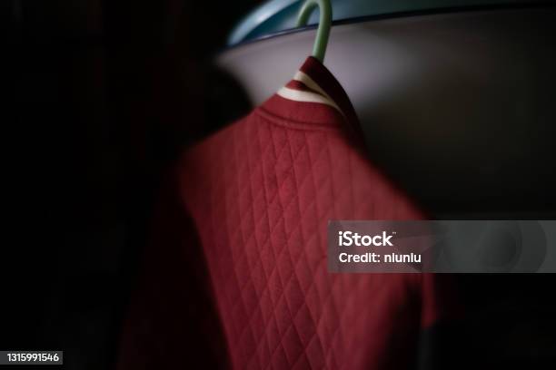 Clothes Hanging On A Hanger Stock Photo - Download Image Now - Arts Culture and Entertainment, Autumn, Blank