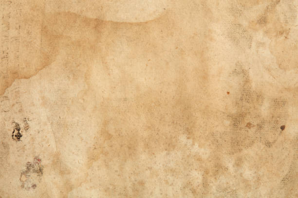 istock Old paper with humidity sings and faded writing texture background 1315997403