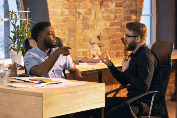 istock Colleagues working together in modern office using devices and gadgets during creative meeting 1315999958