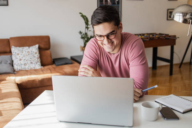 istock Young man working on the laptop at home 1316002071