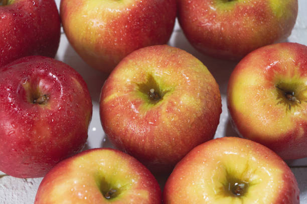 istock Top view of apples with water drops 1316004004