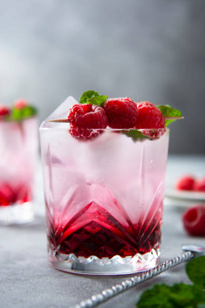 istock Summer fresh beverage cocktail with fresh raspberries and fresh mint. 1316004936