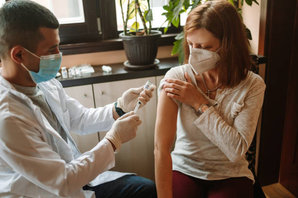 istock Covid 19 vaccination at home 1316005995