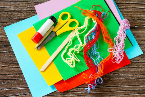 istock Instructions step 1. Summer puppet stics toy octopus. Handmade. Handmade. Childrens creativity project, crafts for kids. 1316006621