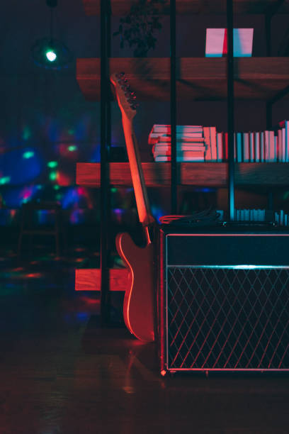 istock Electric guitar and classic amplifier 1316006791