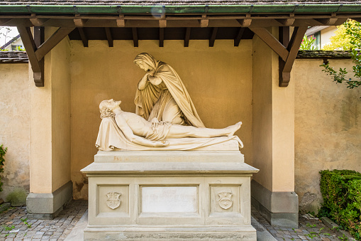 Lamentation of Christ, sculpture dating 1878 located outdoors by the Mariahilfkapelle, a chapel in the former cemetery of Zug, the capital of the Swiss canton of Zug