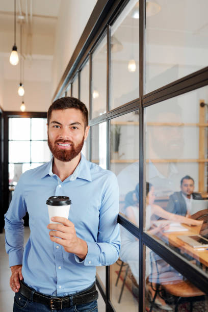 istock Entrepreneur with cup of coffee 1316007565