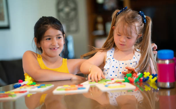 istock Good friends playing with learning toys at the countertop kitchen 1316007799