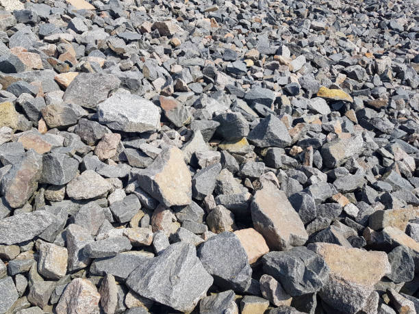 istock Background of broken stones close-up. Broken gravel texture 1316007949