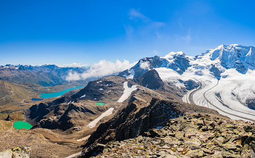 Lago Bianco and the nearby Lago Nero (literally White Lake and Black Lake) at the Bernina pass and at right the Morteratsch glacier, Swiss canton of Graubuenden (3 shots stitched)