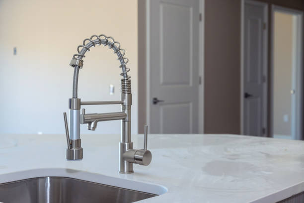 istock Modern domestic cabinets with new sink in kitchen 1316012864