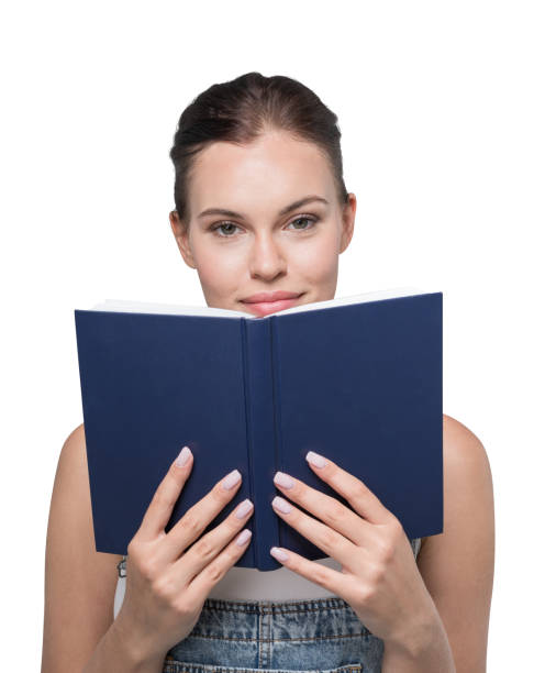 istock Young woman with book, isolated portrait 1316015407