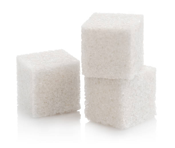 istock Close-up of three white sugar cubes on white 1316015594