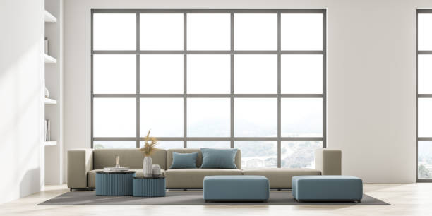 istock Living room interior with large panoramic window with countryside view 1316021405