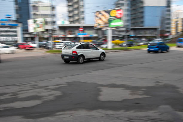 Ukraine, Kyiv - 26 April 2021: White SsangYong Actyon car moving on the street. Editorial
