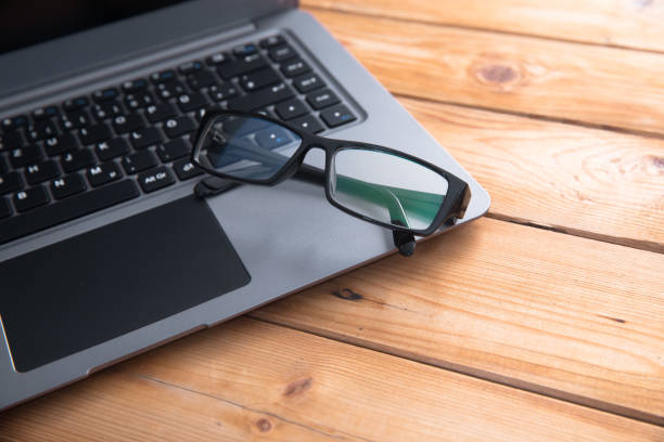 istock Selective focus Eyeglasses with laptop keyboard 1316030688