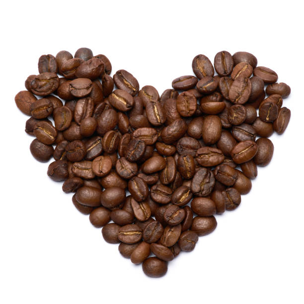 istock Heart shaped roasted coffee beans isolated on white background 1316032059