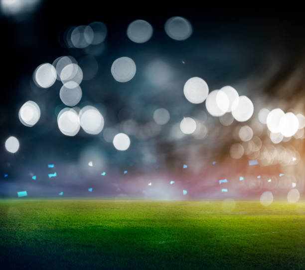 istock soccer stadium with illumination, green grass and night sky. 3d rendering 1316032990