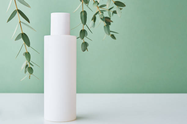 istock Cosmetics beauty mockup. White bottle on pastel background 1316033190