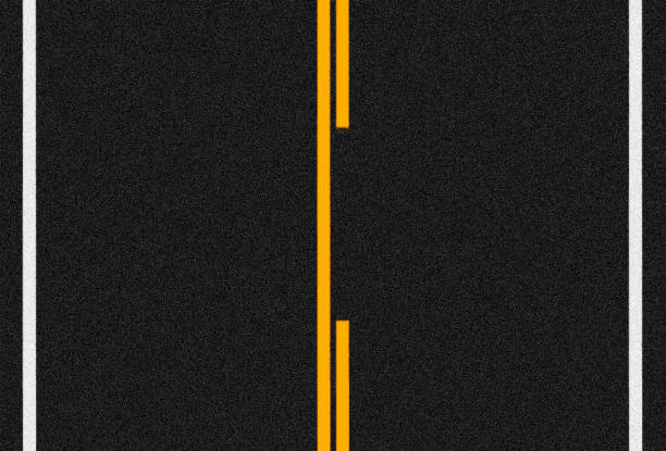 istock Asphalt road surface with orange and white lines 1316033927